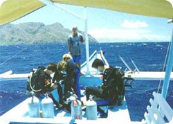 Dive Right scuba divers ready to drop on the Japanese ship Irako in Coron Bay, Busuanga Island, Palawan, Philippines